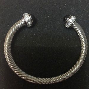 Silver cable wire bracelet with black rhinestone tips